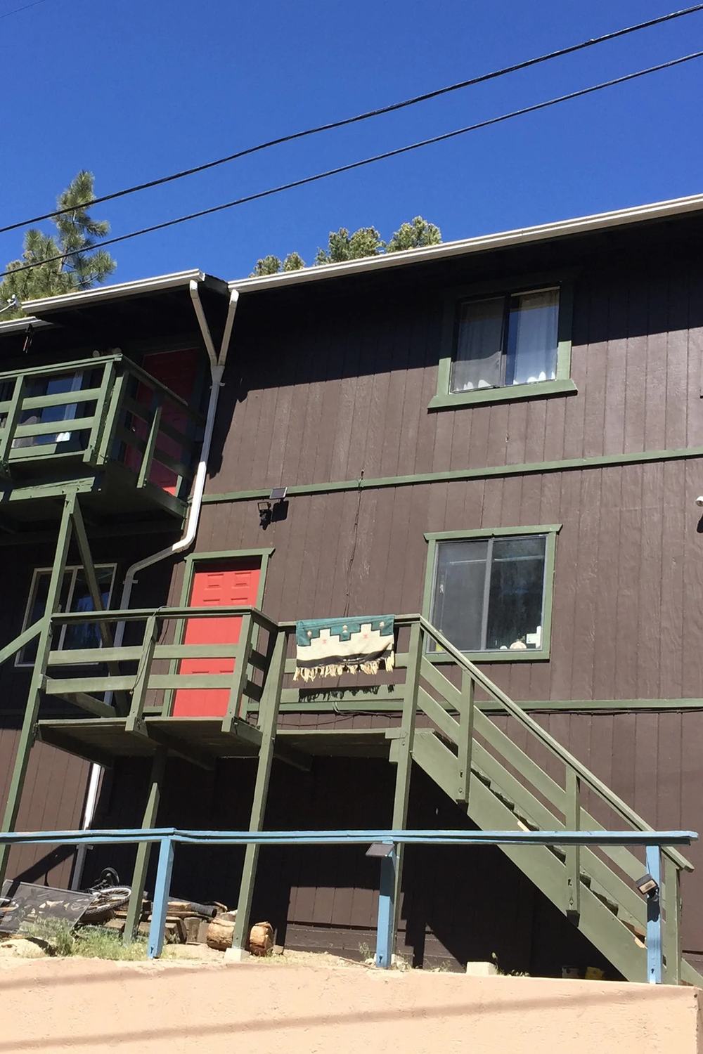 Moonridge home with cool exterior palette by Highland Coat Painting — photo 3 of 4