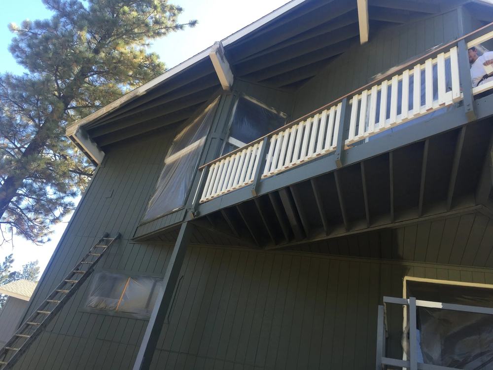 Moonridge home with cool exterior palette by Highland Coat Painting — photo 4 of 4